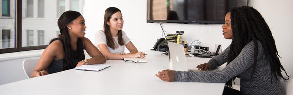 woman at a job interview (c) Christina Wocintechchat Unsplash